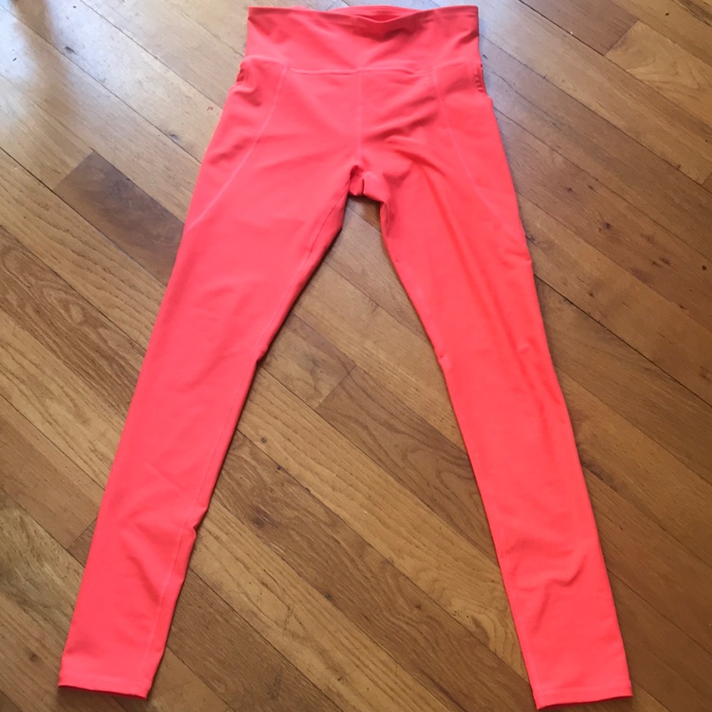 Bright orange leggings. Gently worn. Old navy. XL(girls). Has pockets